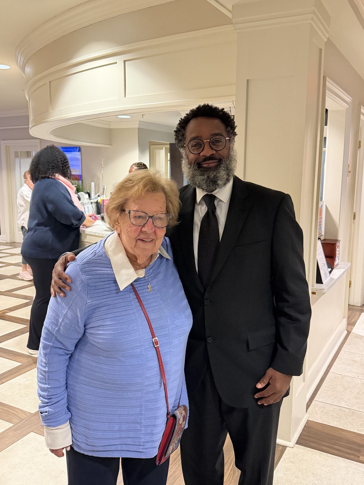 George Fernandez Jr. with a Teaneck senior resident