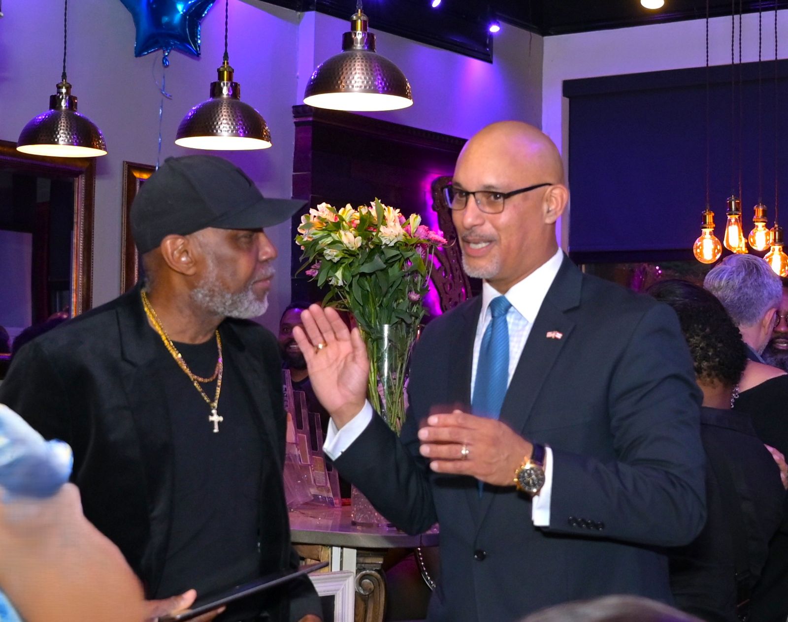 George Fernandez Jr. greeting a supporter at the kick-off