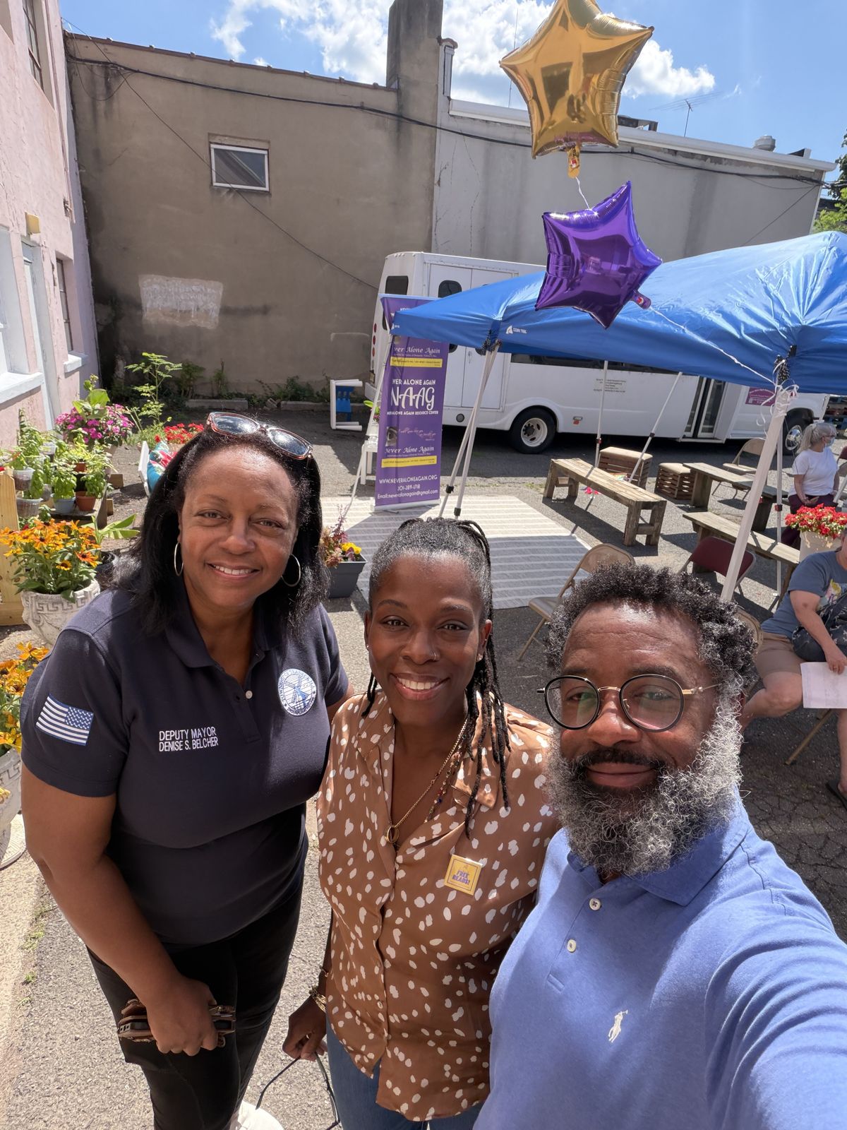 Teaneck First supporters snapping a selfie at a neighborhood event