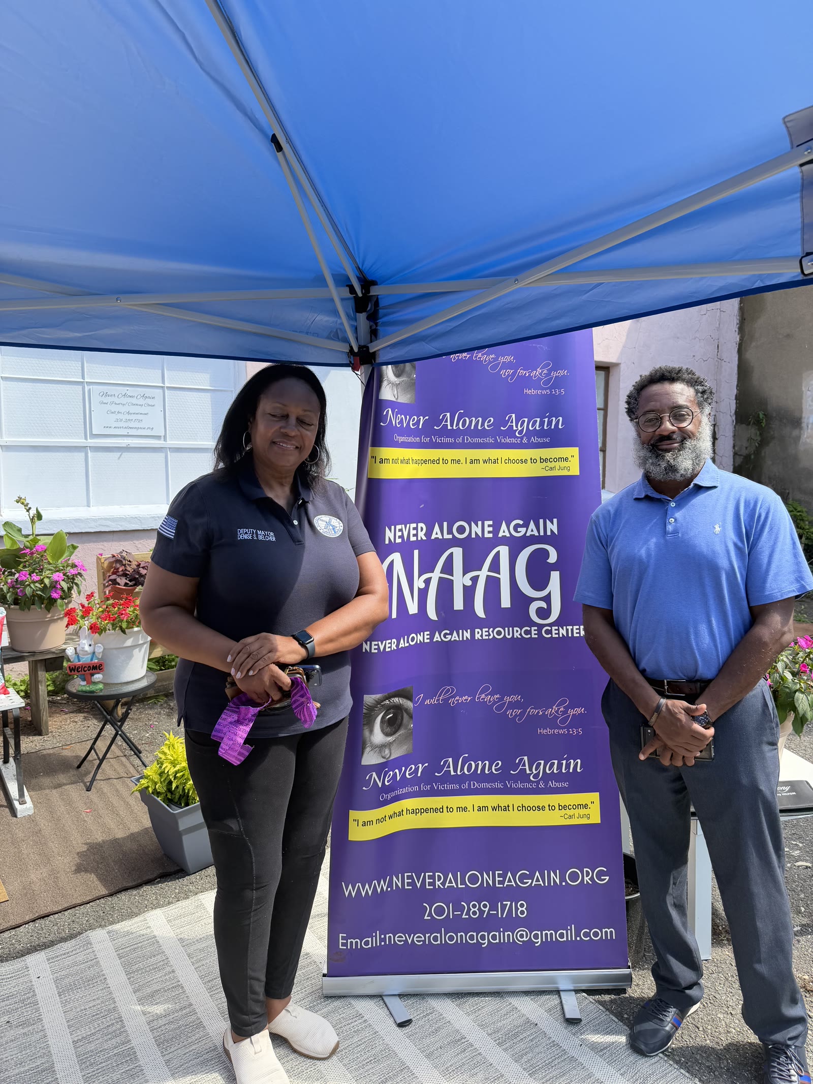 Teaneck First with the Never Alone Again Resource Center at a community event
