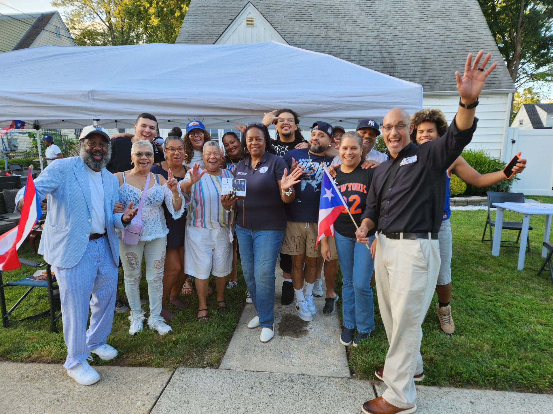 Supporters and candidates gathered at a neighborhood gathering